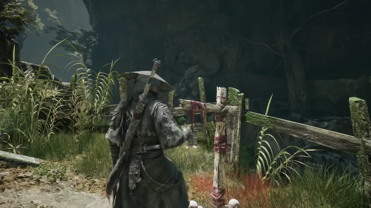 Soul at the bell of The Lady's Rift, a post wrapped in red thread by a broken fence